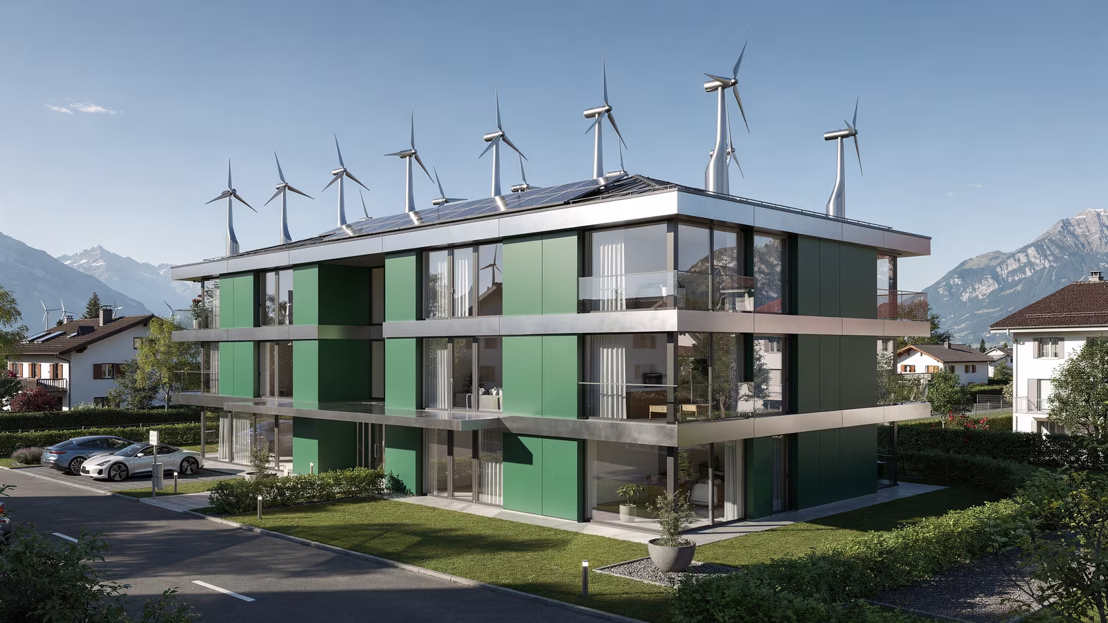 Mehrfamilienhaus mit begrünter Umgebung und Photovoltaik auf dem Dach